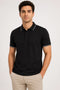 Rare Mode Men’s 280 GSM Bio-Washed Cotton Polo T-Shirt in Black with White Tipping front view
