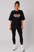 Women's black fitness bow oversized T-shirt full model view