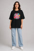Women's floral smiley premium cotton oversized T-shirt in black - full view