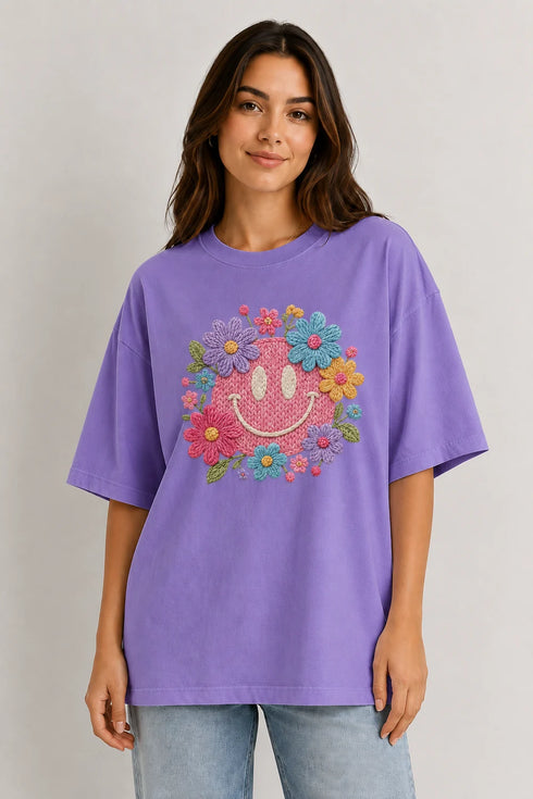 Women's floral smiley premium cotton oversized T-shirt in purple - front